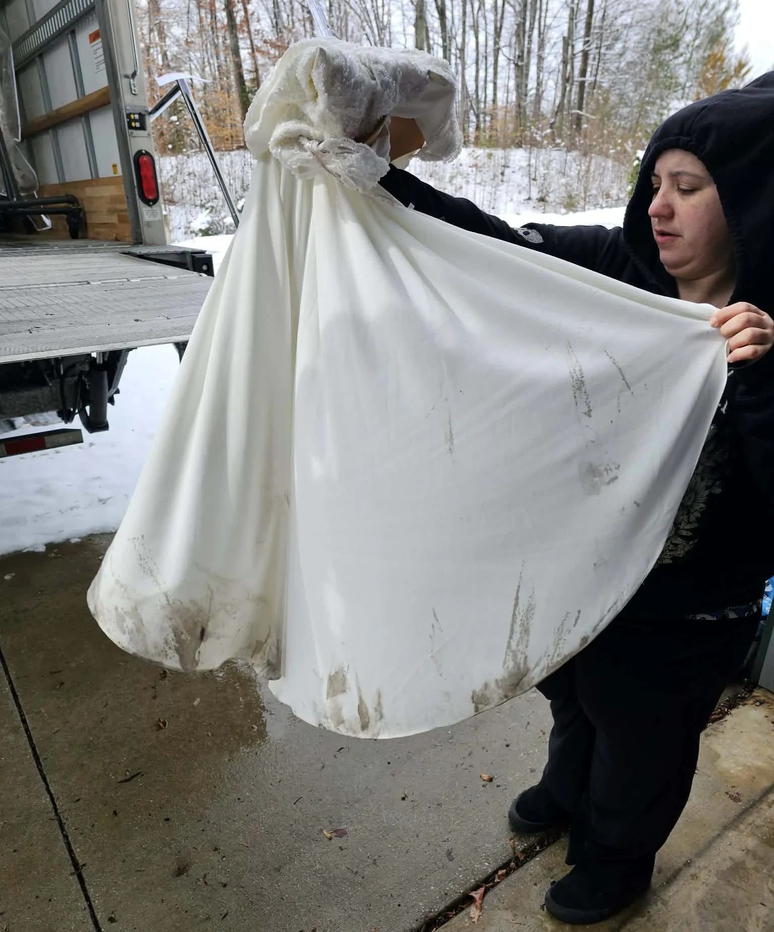 Gown with heavy dirt staining on skirt
