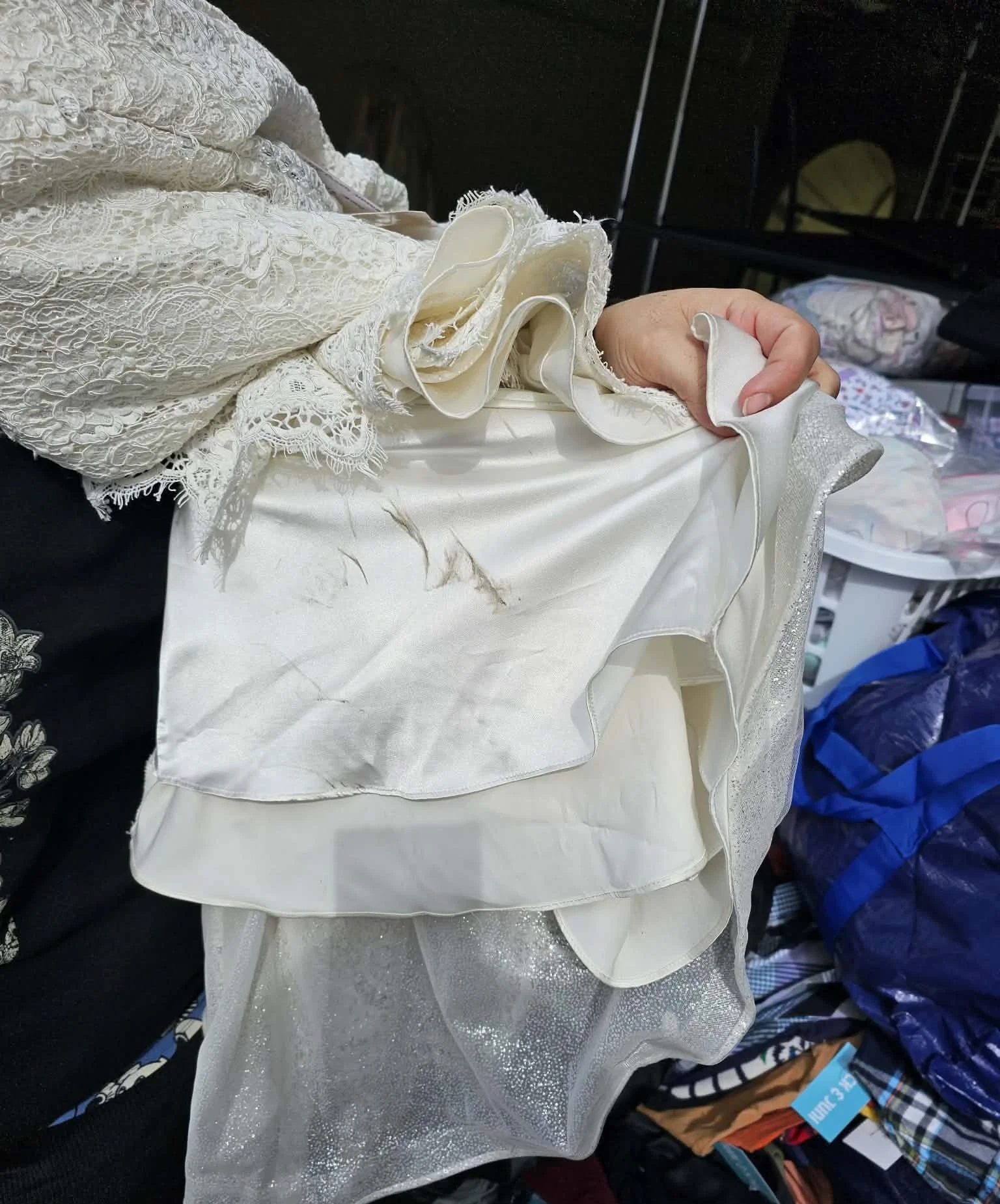 Damaged gown with torn fabric
