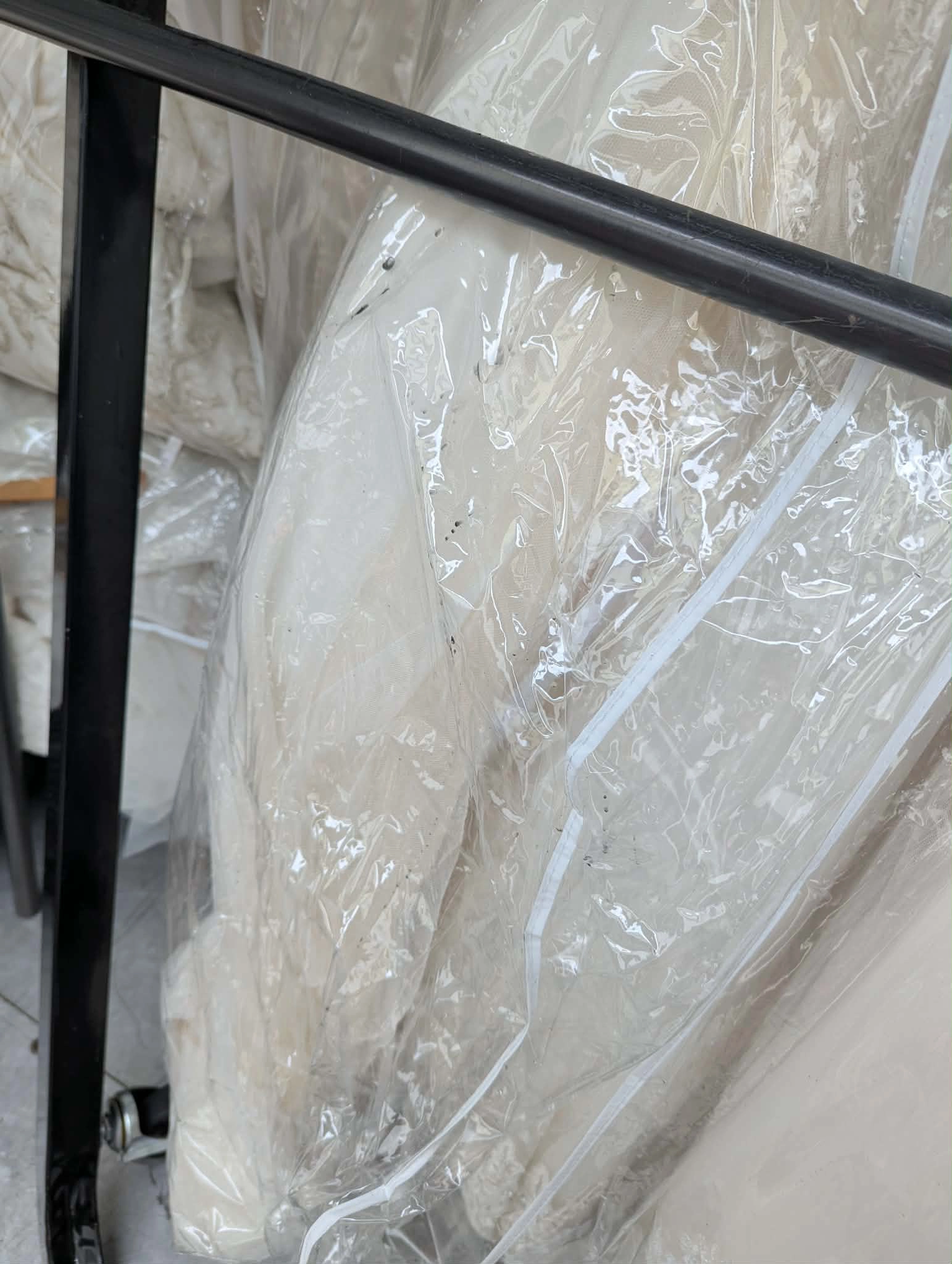 Gowns on damaged rack in truck